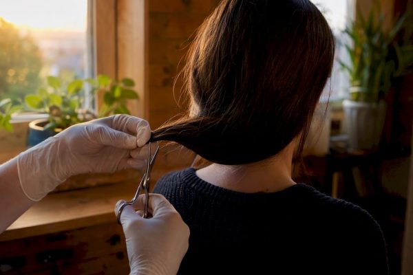 Close-up of hair sample cutting outdoors